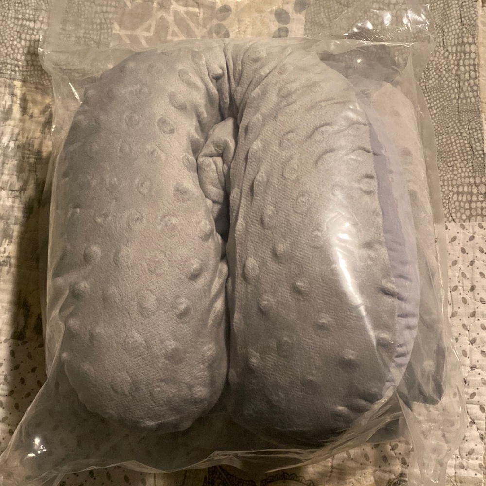 Head and neck support for car seat. New in package